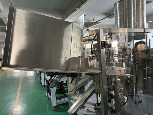 Automatische machine voor het vullen en afdichten van cosmetische tandpasta's
