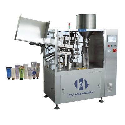 Automatische machine voor het vullen en afdichten van cosmetische tandpasta's